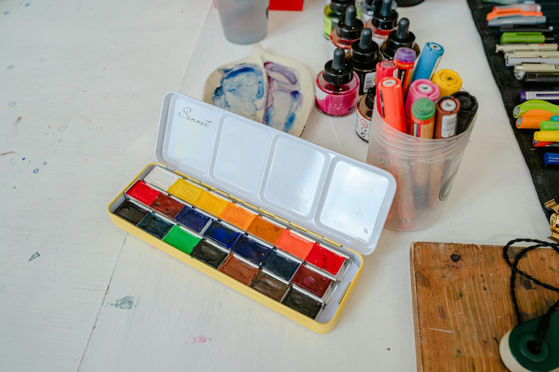 Art supplies on a studio table